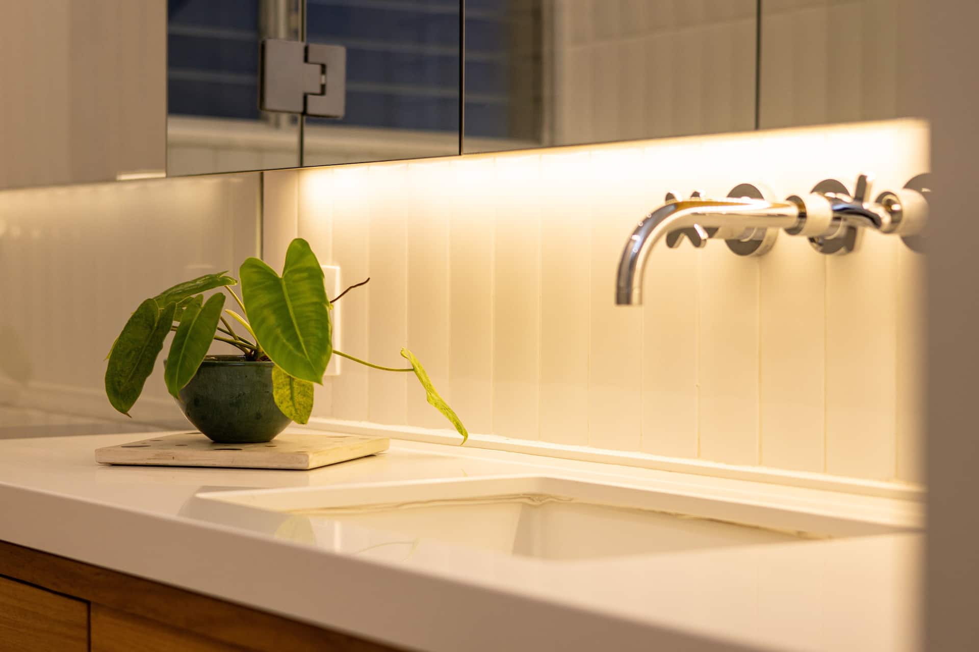 Bathroom vanity with warm lighting